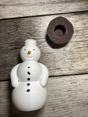 schránka pro hru geocaching - sněhulák